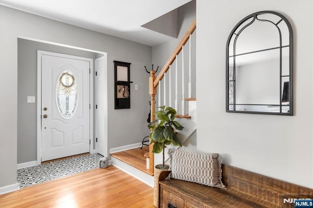 39 Division Ave, Hasbrouck Heights, NJ 07604 - foyer entrance with wood finished floors and stairs