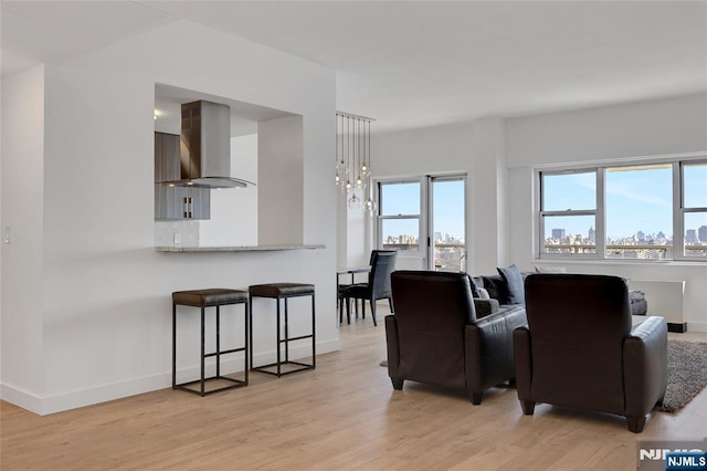 6600 Jfk Blvd E Unit 23L, West New York, NJ 07093 - living area featuring light wood finished floors and baseboards