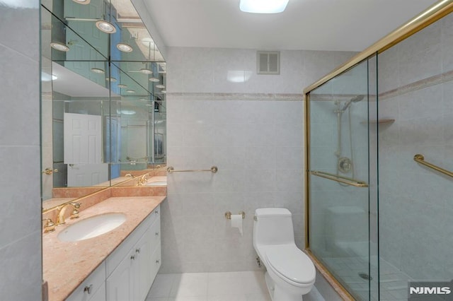 300 Winston Unit 2105, Cliffside Park, NJ 07010 - full bath featuring tile walls, vanity, a stall shower, and tile patterned flooring