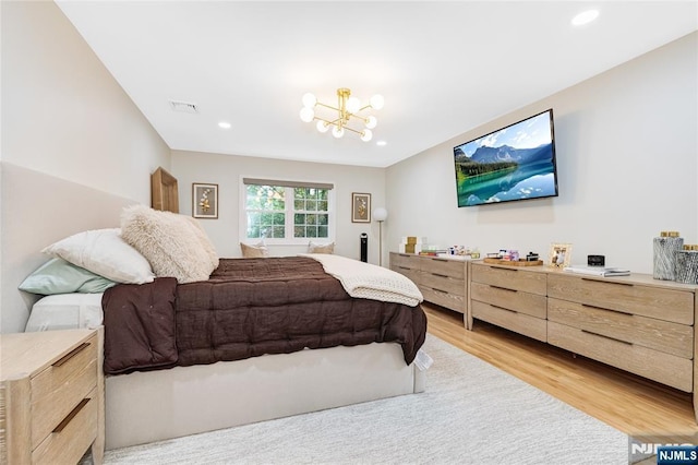 15 Kings Ct, Woodcliff Lake, NJ 07677 - bedroom with light wood finished floors, a chandelier, and recessed lighting