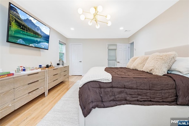 15 Kings Ct, Woodcliff Lake, NJ 07677 - bedroom featuring light wood finished floors, a chandelier, and recessed lighting