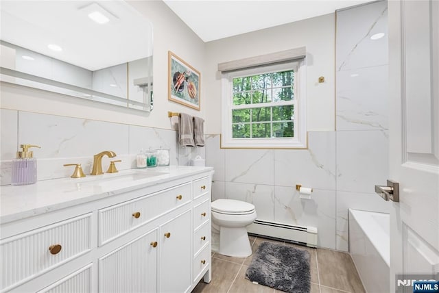 15 Kings Ct, Woodcliff Lake, NJ 07677 - full bathroom featuring a baseboard heating unit, tile walls, vanity, tile patterned flooring, and wainscoting