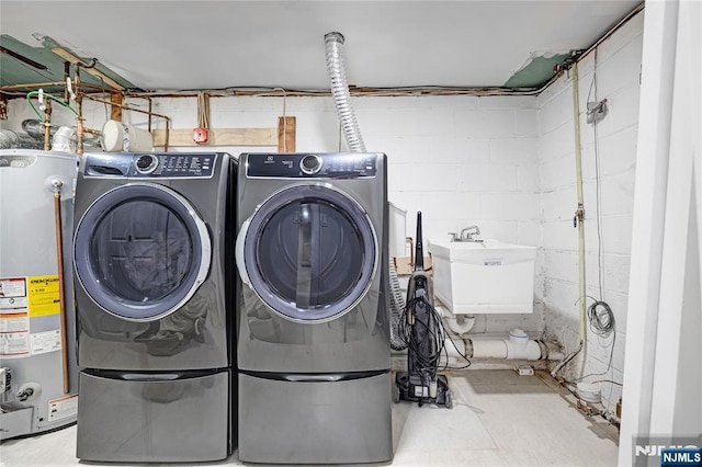 15 Kings Ct, Woodcliff Lake, NJ 07677 - laundry area featuring water heater, washer and clothes dryer, and concrete block wall