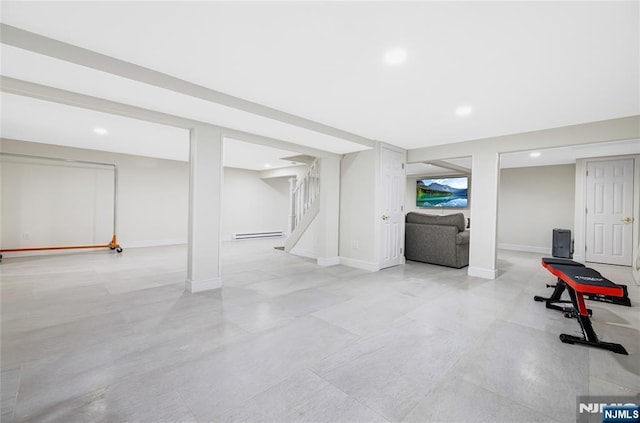 15 Kings Ct, Woodcliff Lake, NJ 07677 - finished below grade area featuring a baseboard heating unit, recessed lighting, and stairway