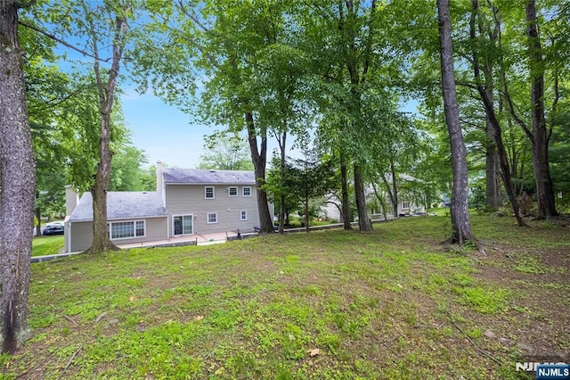 15 Kings Ct, Woodcliff Lake, NJ 07677 - view of green lawn with a patio area