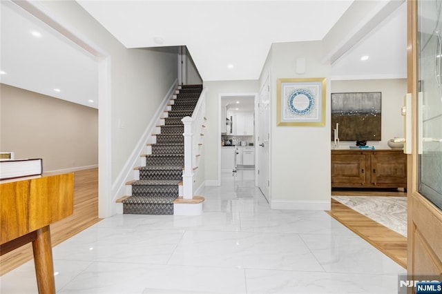 15 Kings Ct, Woodcliff Lake, NJ 07677 - foyer featuring stairs and light marble finish flooring