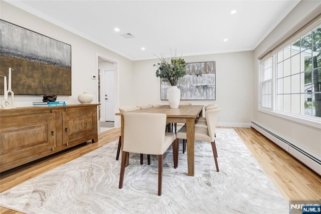 15 Kings Ct, Woodcliff Lake, NJ 07677 - dining area with a baseboard radiator, light wood-type flooring, ornamental molding, and recessed lighting