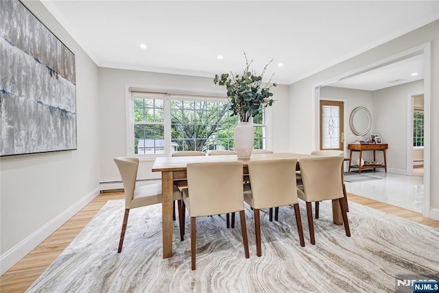 15 Kings Ct, Woodcliff Lake, NJ 07677 - dining room featuring light wood finished floors, recessed lighting, a baseboard heating unit, baseboard heating, and crown molding