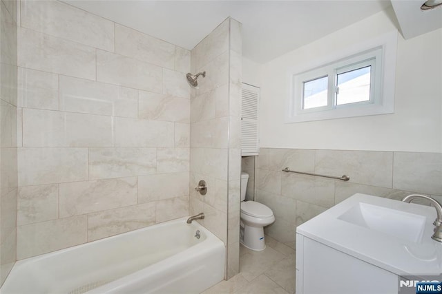 419 Central Ave, Haledon, NJ 07508 - full bathroom with bathtub / shower combination, vanity, and tile walls
