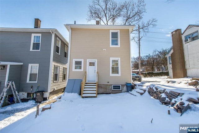 419 Central Ave, Haledon, NJ 07508 - snow covered property featuring entry steps