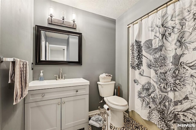 16 Iron Forge Vlg, Pompton Lakes, NJ 07442 - bathroom featuring vanity, a textured ceiling, and a shower with shower curtain