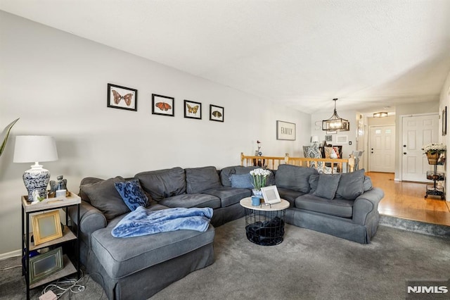 16 Iron Forge Vlg, Pompton Lakes, NJ 07442 - carpeted living area featuring a chandelier
