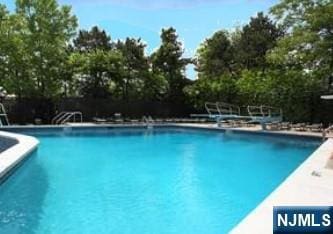 2000 Linwood Ave Unit 3P, Fort Lee, NJ 07024 - community pool featuring view of scattered trees