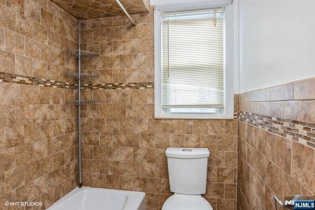 24 Hutton Ave Unit 46, West Orange, NJ 07052 - bathroom featuring tile walls and bathtub / shower combination