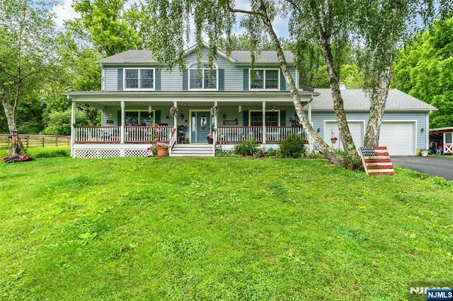15 Franeks Rd, Hamburg, NJ 07419 - view of front of home featuring driveway, an attached garage, and a porch