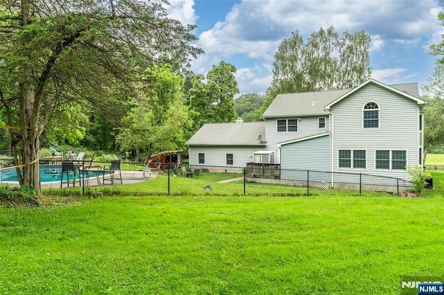 15 Franeks Rd, Hamburg, NJ 07419 - rear view of house featuring a shingled roof and a wooden deck
