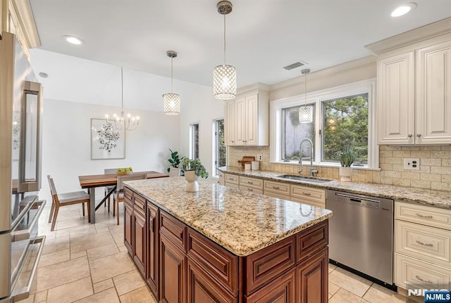 33 Berkshire Rd, Woodcliff Lake, NJ 07677 - kitchen featuring appliances with stainless steel finishes, decorative backsplash, a center island, light stone countertops, and recessed lighting