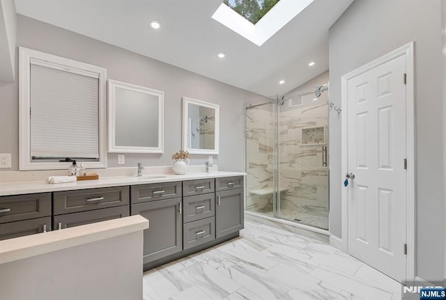 33 Berkshire Rd, Woodcliff Lake, NJ 07677 - full bath with a skylight, a marble finish shower, marble look tile flooring, vaulted ceiling, and double vanity