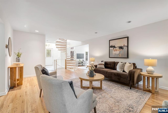33 Berkshire Rd, Woodcliff Lake, NJ 07677 - living area featuring light wood-style floors, stairway, and recessed lighting