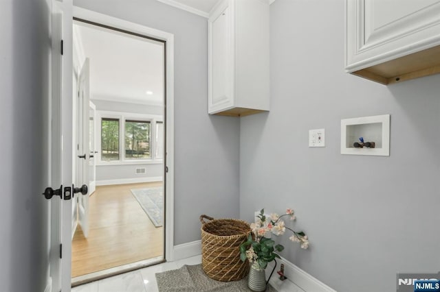 432 Fox Chase Rd, Chester Township, NJ 07930 - washroom featuring washer hookup, cabinet space, and ornamental molding