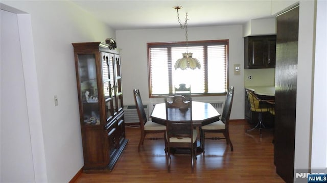 17 Gunther Ave, Lodi, NJ 07644 - dining room with dark wood-type flooring and baseboards