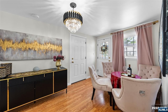 63 Rosedale Ave, Clifton, NJ 07013 - dining area featuring a chandelier and light wood-style flooring