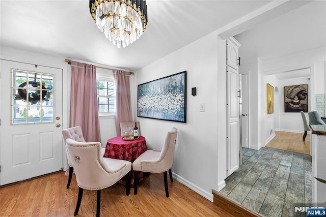 63 Rosedale Ave, Clifton, NJ 07013 - dining area featuring wood finished floors and a chandelier
