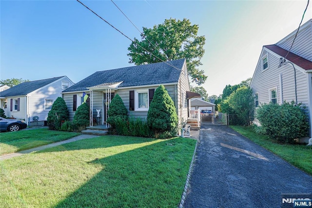 136 Martin Ave, Clifton, NJ 07012 - bungalow featuring driveway, a gate, and a shingled roof