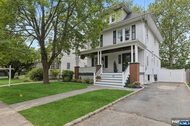30 Hillcrest Ter, Verona, NJ 07044 - american foursquare style home with covered porch, a gate, stairs, and asphalt driveway