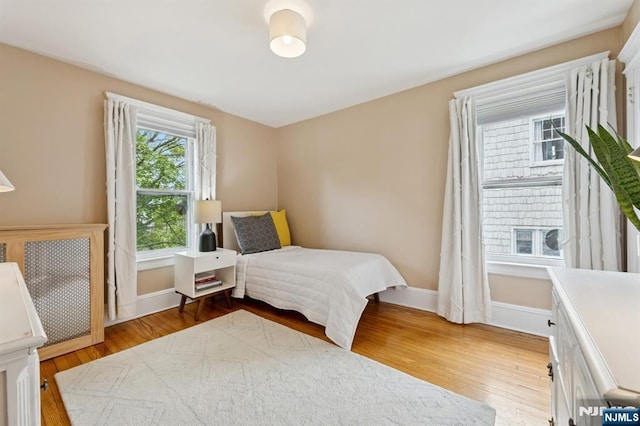 30 Hillcrest Ter, Verona, NJ 07044 - bedroom with wood finished floors and radiator heating unit