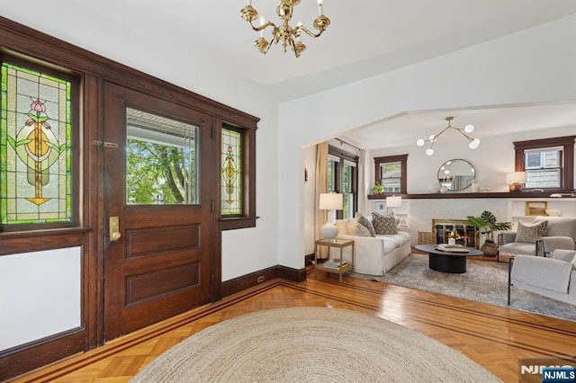 30 Hillcrest Ter, Verona, NJ 07044 - entryway featuring a chandelier and a brick fireplace