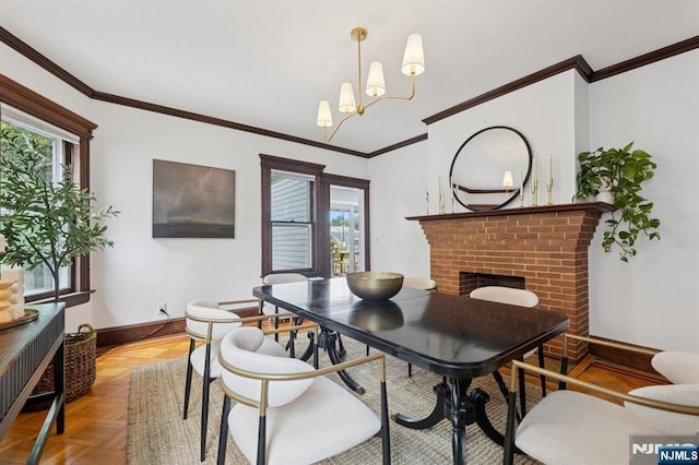 30 Hillcrest Ter, Verona, NJ 07044 - dining space with plenty of natural light, a brick fireplace, ornamental molding, and a chandelier
