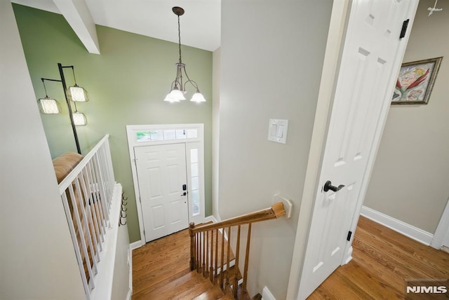 49 Longview Trl, Denville Township, NJ 07834 - entryway with wood finished floors and a chandelier