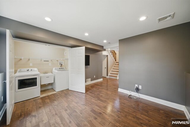 49 Longview Trl, Denville Township, NJ 07834 - laundry area with washing machine and clothes dryer, wood finished floors, and recessed lighting