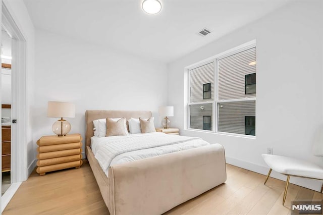 649 38th St Unit 304, Union City, NJ 07087 - bedroom featuring light wood-type flooring and baseboards