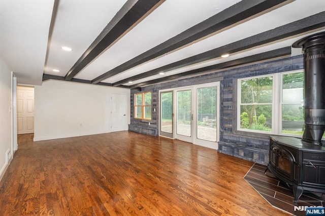 44 Grover Dr, Wayne, NJ 07470 - living area featuring a wood stove, beamed ceiling, and wood finished floors