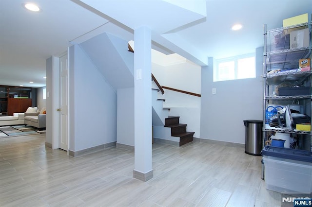 62 Rivervale Rd, Park Ridge, NJ 07656 - basement featuring stairs, wood finished floors, and recessed lighting