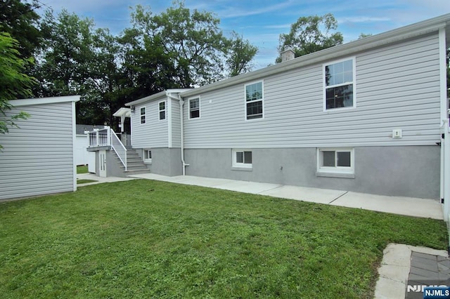 62 Rivervale Rd, Park Ridge, NJ 07656 - rear view of property featuring a yard, stairway, and a wooden deck