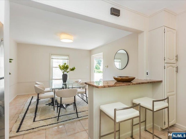 100 Darling Ave, Bloomfield, NJ 07003 - dining area featuring light tile patterned floors and baseboards