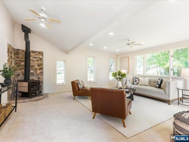 100 Darling Ave, Bloomfield, NJ 07003 - living room featuring a wood stove, a ceiling fan, recessed lighting, carpet, and lofted ceiling