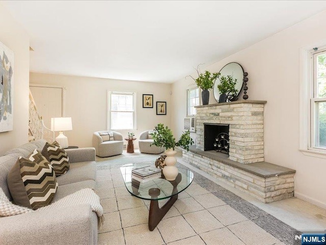 100 Darling Ave, Bloomfield, NJ 07003 - living area featuring plenty of natural light and a brick fireplace