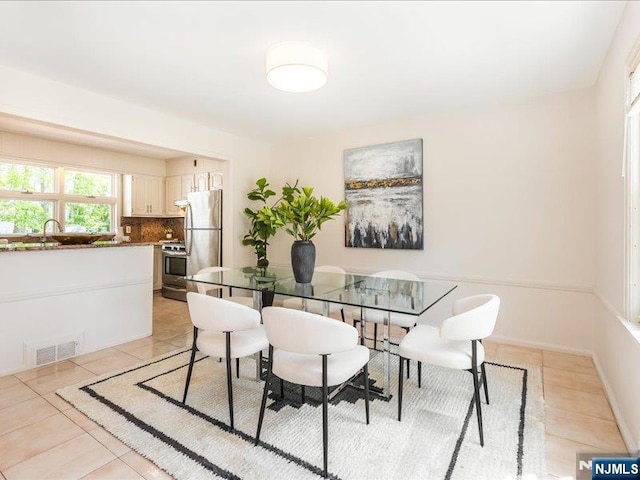 100 Darling Ave, Bloomfield, NJ 07003 - dining space featuring light tile patterned floors