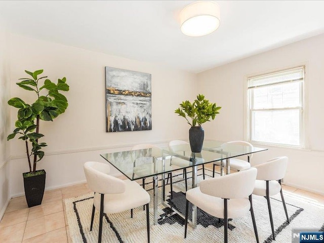 100 Darling Ave, Bloomfield, NJ 07003 - dining room featuring light tile patterned flooring and baseboards