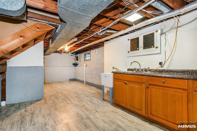 6 Rutgers Pl, Clifton, NJ 07013 - basement with a sink and light wood-style flooring