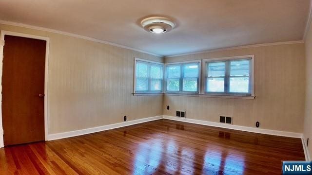 313-321 39th St, Paterson, NJ 07504 - unfurnished room with wood finished floors and crown molding