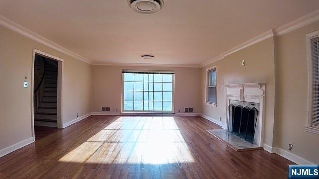 313-321 39th St, Paterson, NJ 07504 - unfurnished living room with wood finished floors, stairs, a fireplace, and crown molding