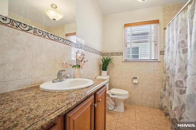 286 State Rt 17, Rutherford, NJ 07070 - bathroom featuring tile walls, vanity, tile patterned flooring, and curtained shower