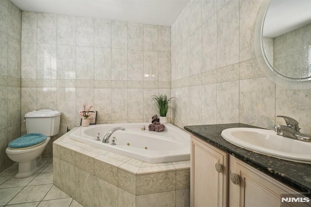 286 State Rt 17, Rutherford, NJ 07070 - full bath with a tub with jets, tile walls, vanity, and tile patterned floors