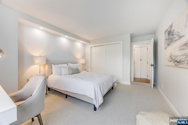 1 Claridge Dr Unit 418, Verona, NJ 07044 - bedroom featuring light colored carpet, a closet, and recessed lighting