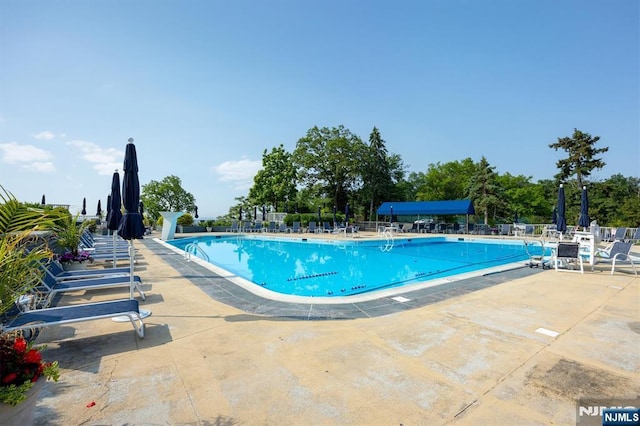 1 Claridge Dr Unit 418, Verona, NJ 07044 - community pool featuring a patio
